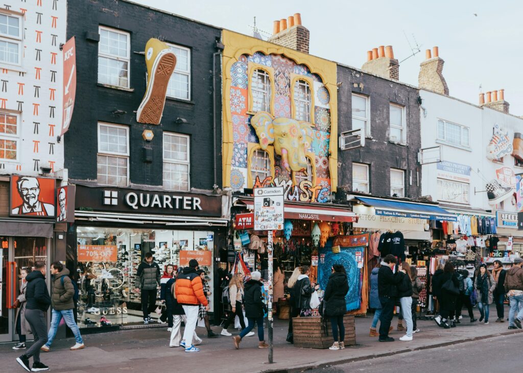 Photo by Artūras Kokorevas: https://www.pexels.com/photo/row-of-shops-on-a-street-in-camden-15521843/